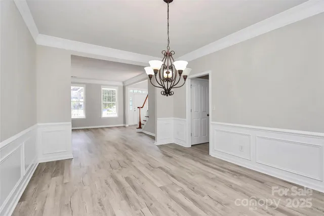 a view of a livingroom with wooden floor