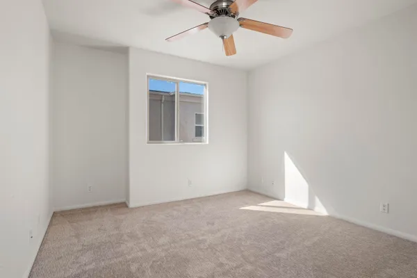 an empty room with a bathroom