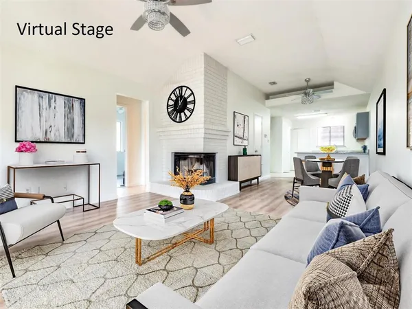 a living room with furniture and a table