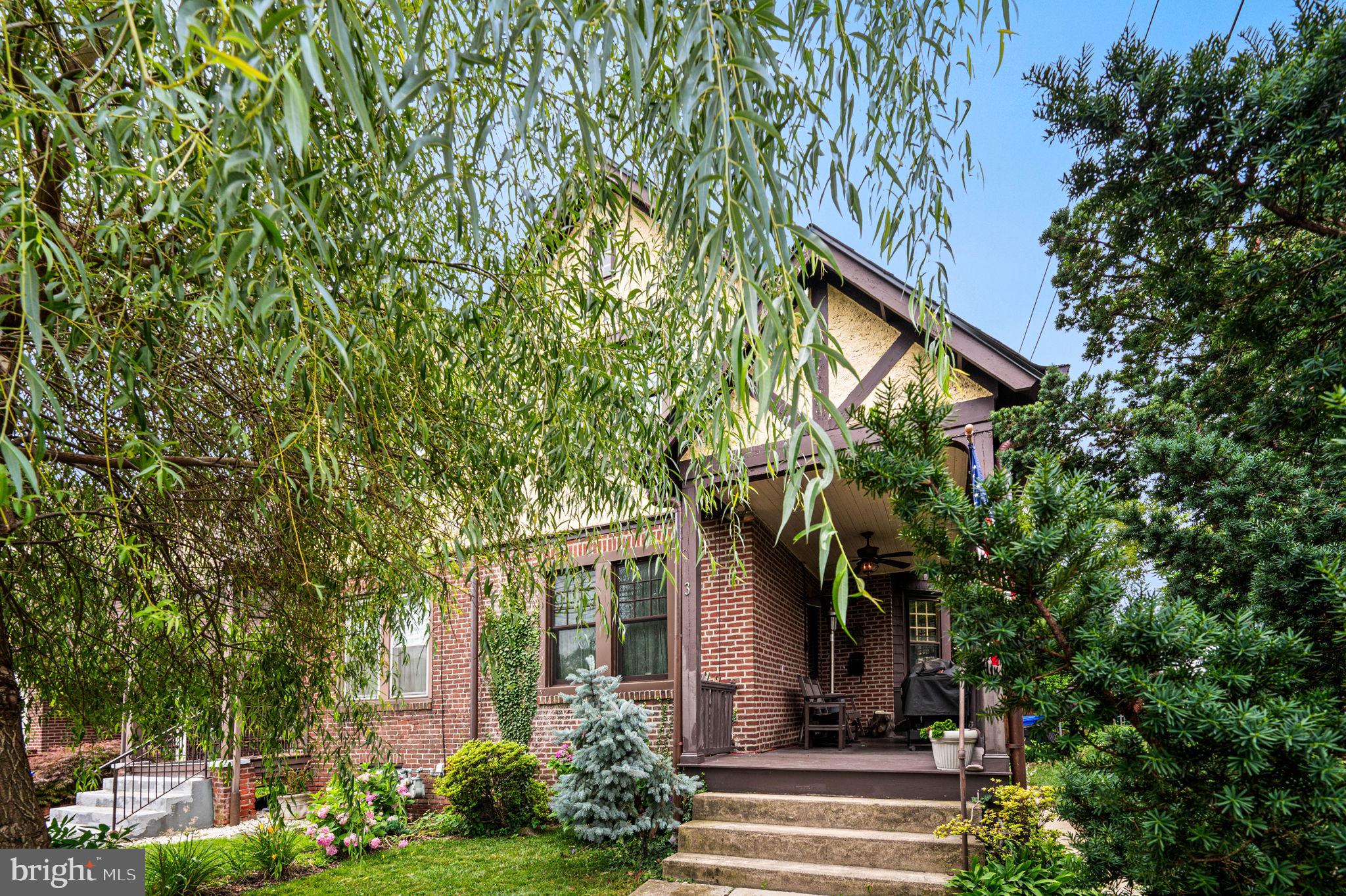 3 Township Line Road Elkins Park, PA 19027 - Photo 4 of 40 Charming home embraced by lush greenery.