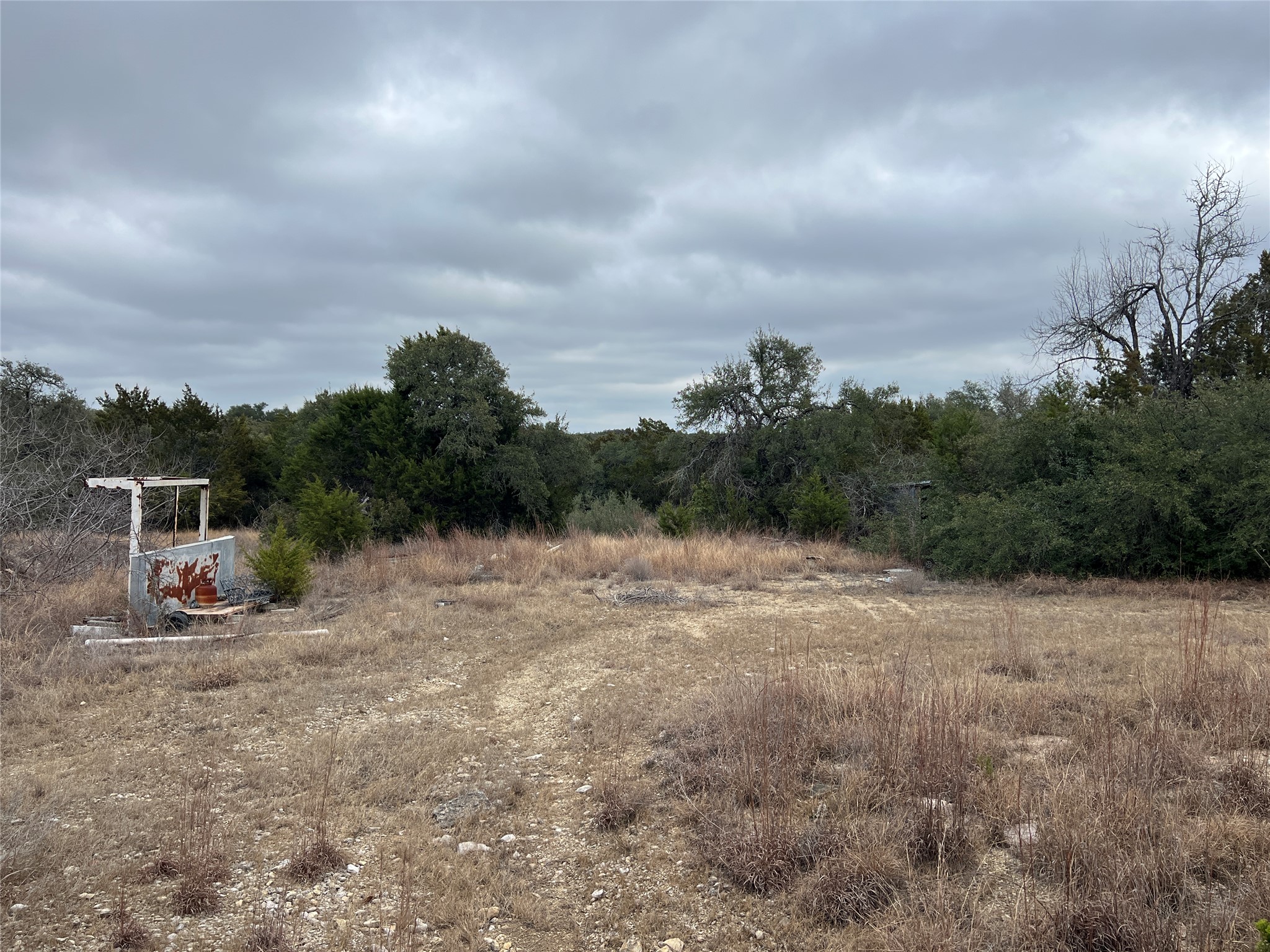 4 Anglin Lane Austin, TX 78737 - Photo 27 of 27 a view of a dry yard with wooden fence