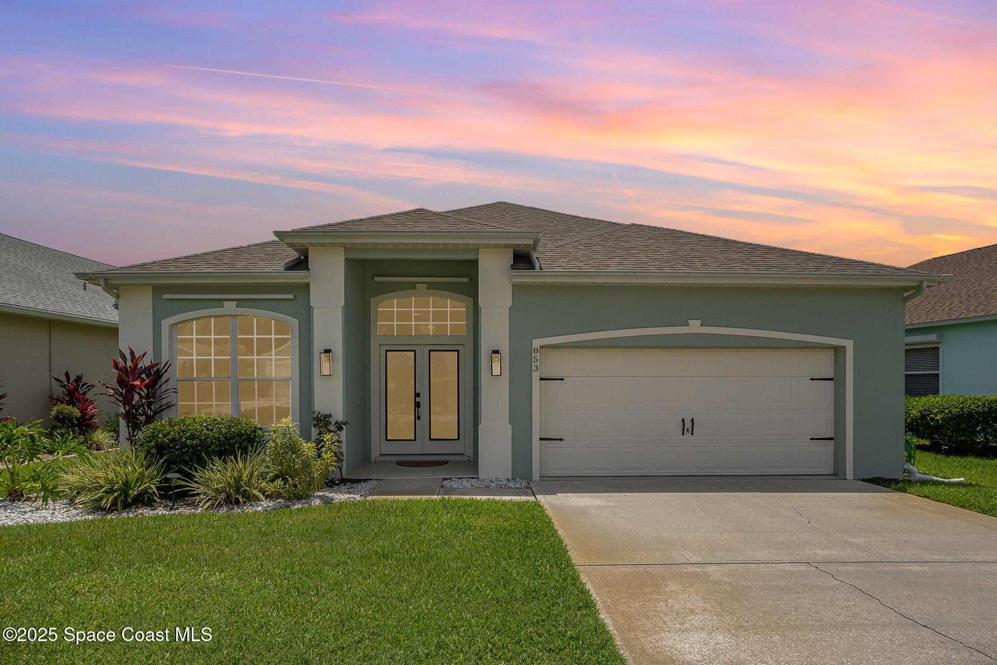 853 Villa Drive Melbourne, FL 32940 - Photo 24 of 26 front view of house with a yard