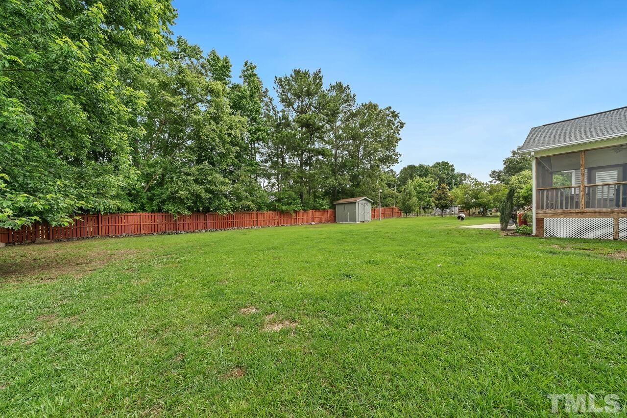 48 Eagle Pointe Lane Clayton, NC 27520 - Photo 19 of 21 a view of green field with house in the background
