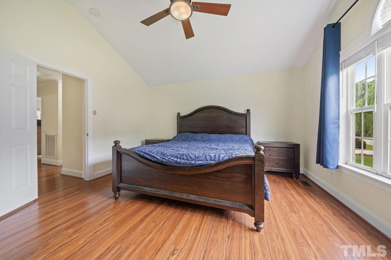 48 Eagle Pointe Lane Clayton, NC 27520 - Photo 10 of 21 a living room with a bed furniture and a window