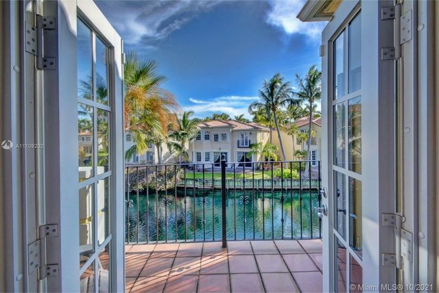 a view of a lake from a balcony