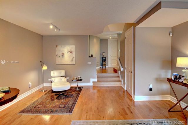 a very nice looking room with wooden floor