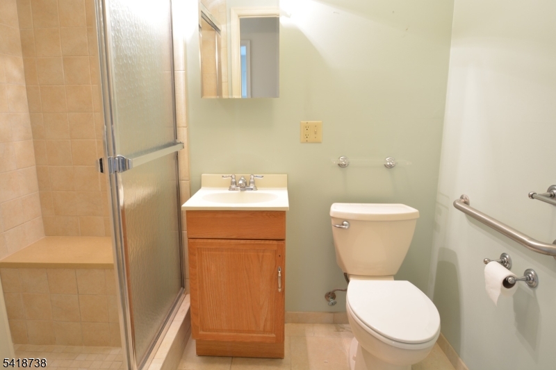37 Park Edge Berkeley Heights, NJ 07922 - Photo 18 of 25 a white toilet sitting next to a bathroom sink