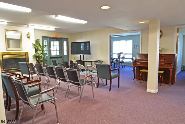 a view of a livingroom with furniture