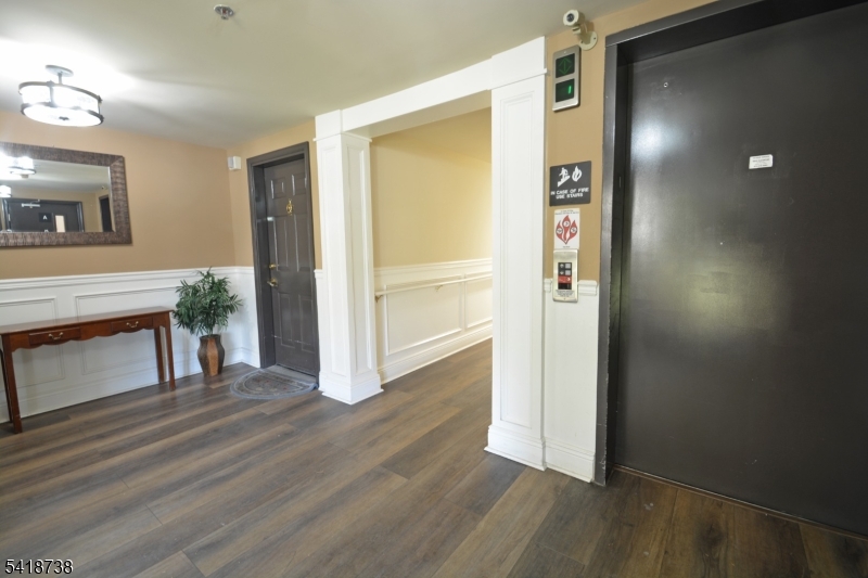 37 Park Edge Berkeley Heights, NJ 07922 - Photo 3 of 25 a view of livingroom with hardwood floor and front door