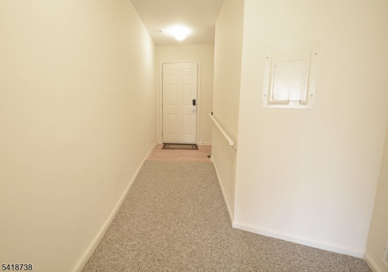 37 Park Edge Berkeley Heights, NJ 07922 - Photo 5 of 25 a view of a hallway with white walls
