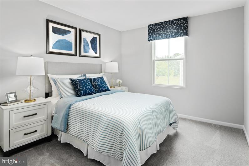 4709 Cooks Hl Road, Unit 39 Lanham, MD 20706 - Photo 15 of 17 a bedroom with a bed and a window