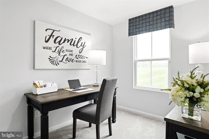 4709 Cooks Hl Road, Unit 39 Lanham, MD 20706 - Photo 10 of 17 a view of a workspace with furniture and a window