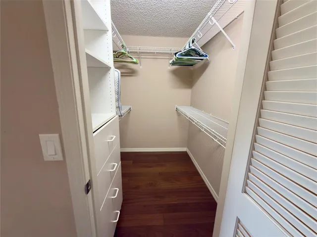 a bathroom with a double vanity sink toilet and mirror