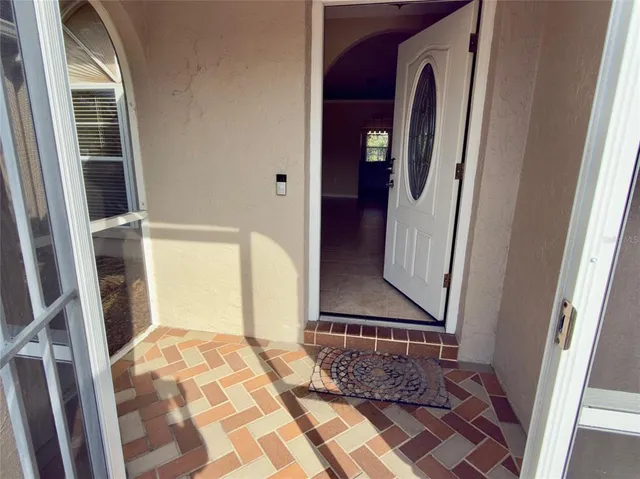 a view of walk in closet with bathroom