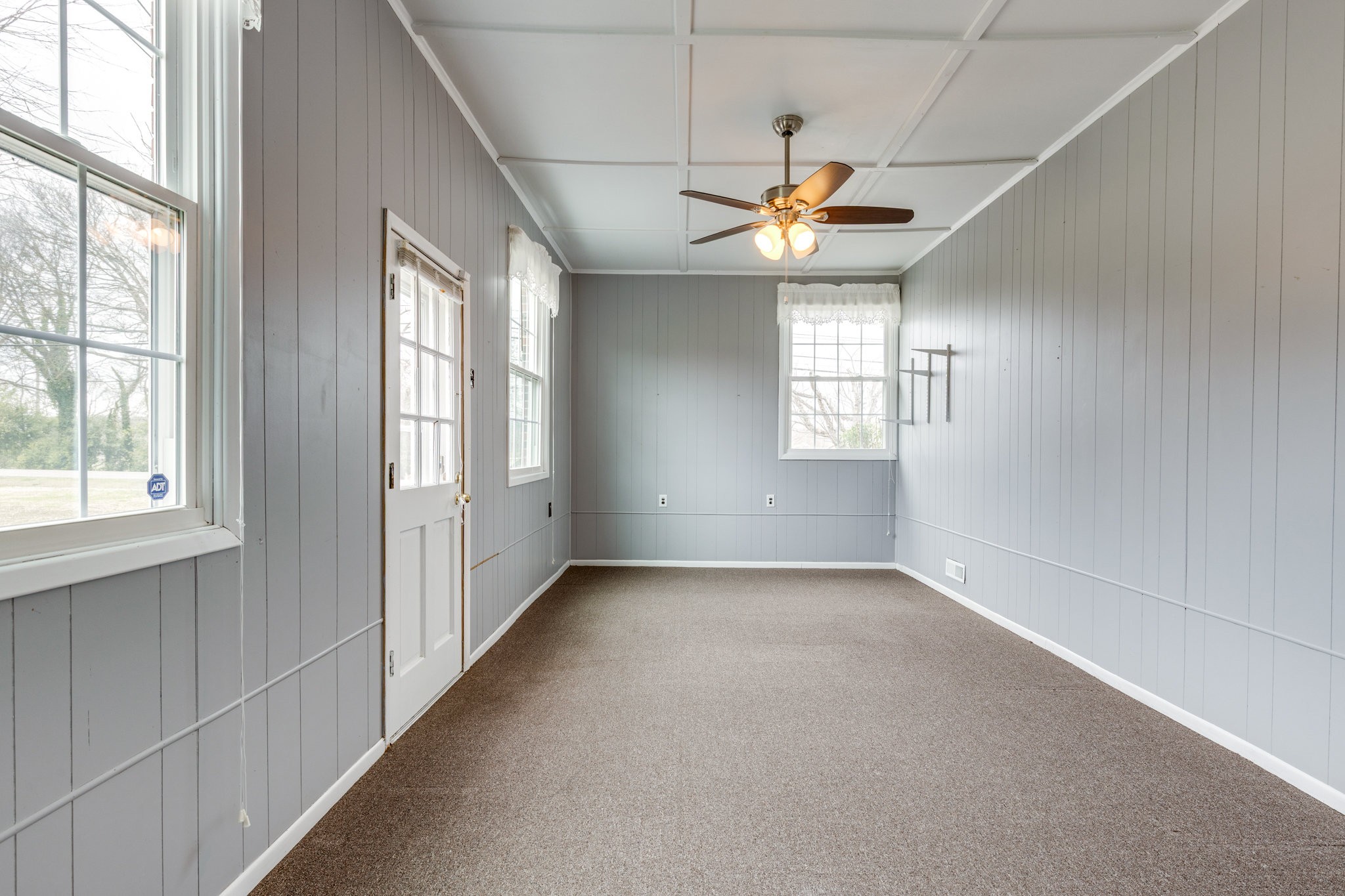 1011 Vales Mill Road Pulaski, TN 38478 - Photo 12 of 32 an empty room with windows and fan
