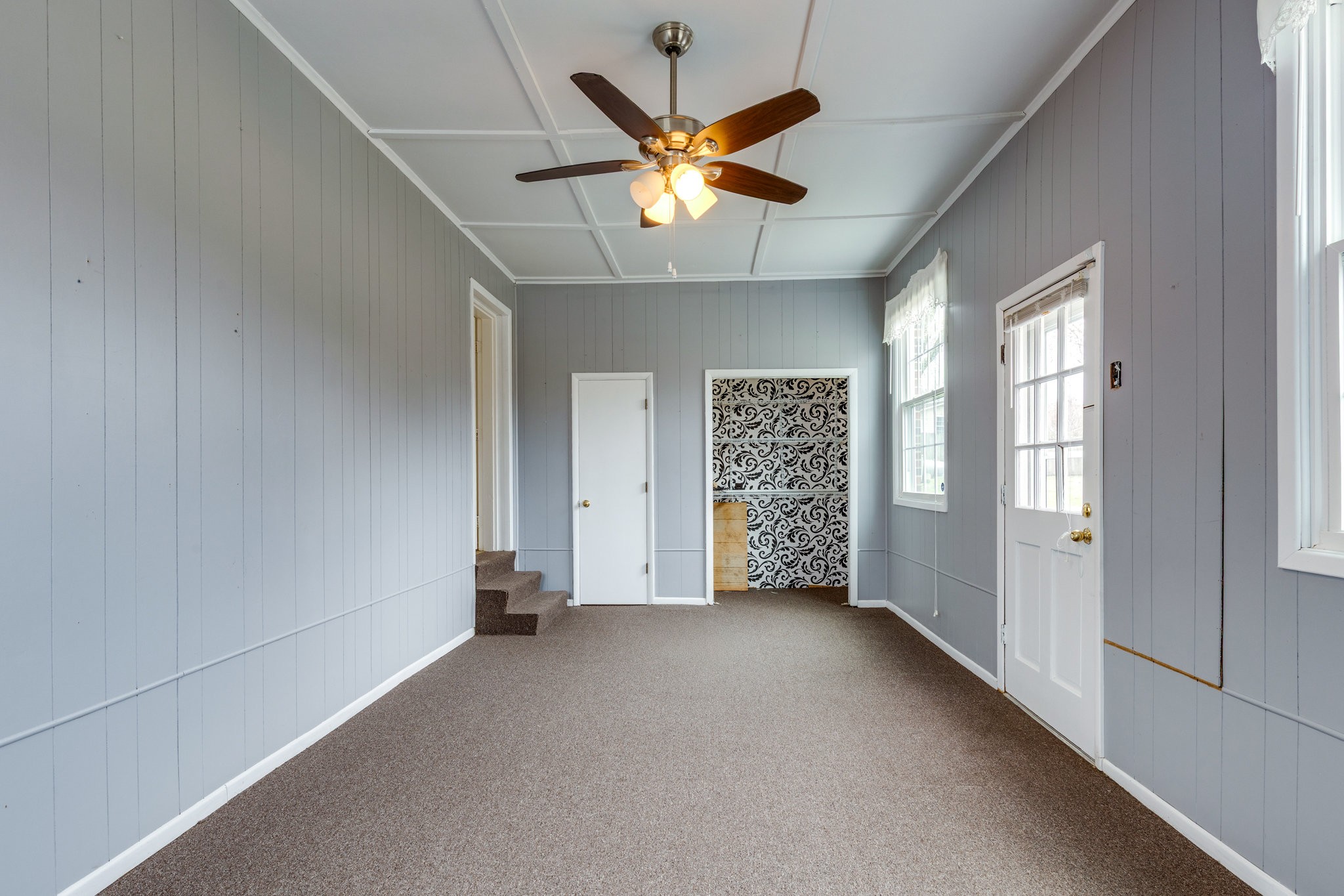 1011 Vales Mill Road Pulaski, TN 38478 - Photo 13 of 32 wooden floor in an empty room with a window