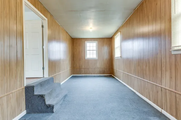 a view of a bathroom from the hallway