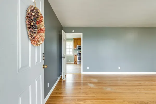 a view of a hallway with an empty room