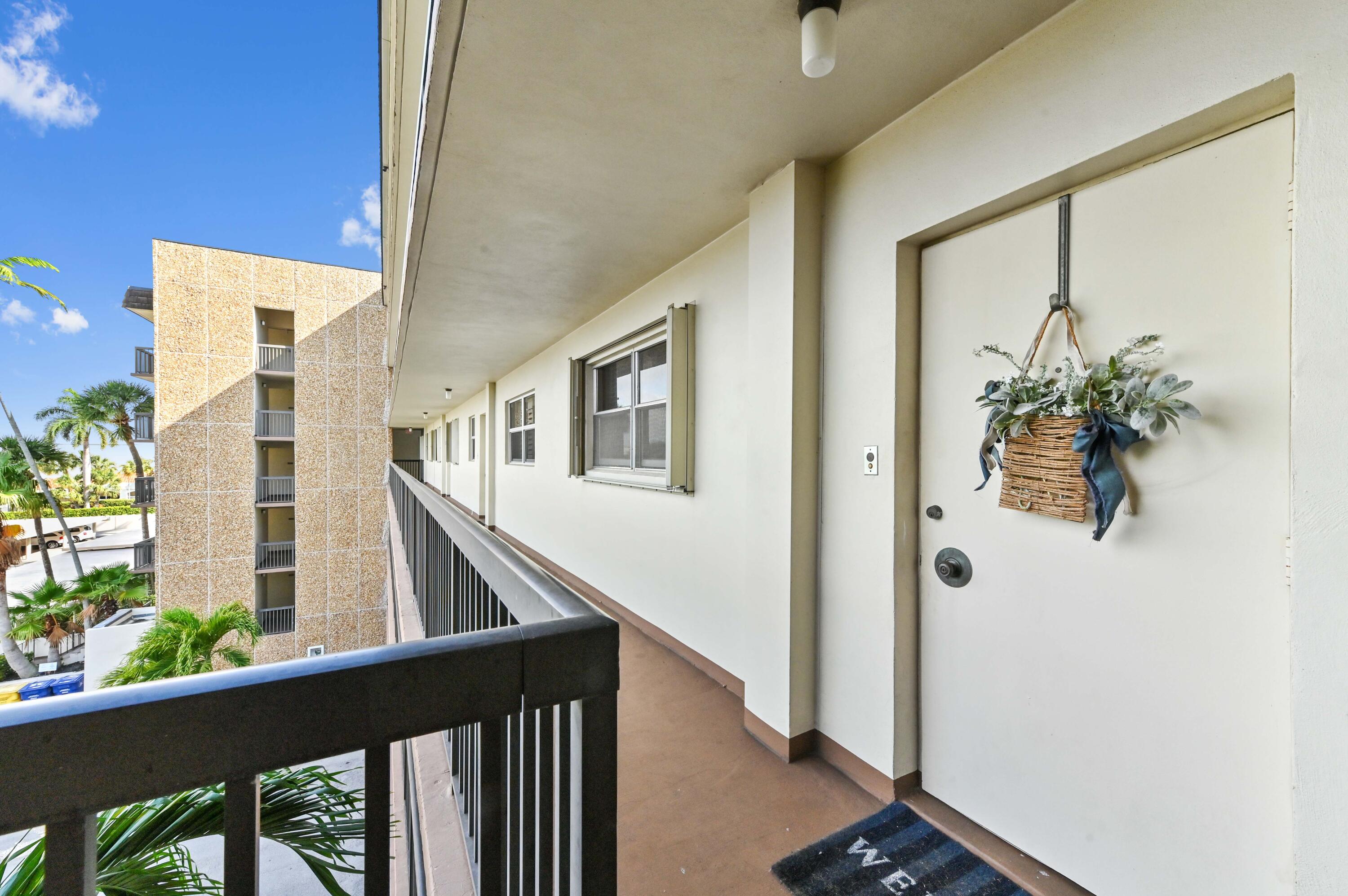 555 Northwest 4th Avenue, Unit 3110 Boca Raton, FL 33432 - Photo 27 of 29 Front Door Near Elevator