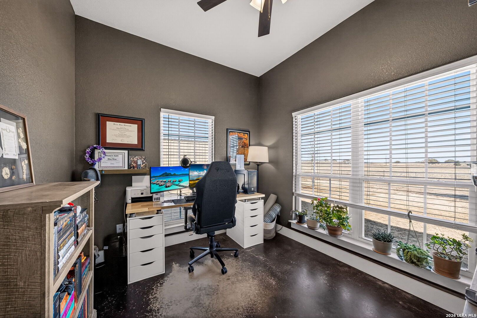 932 County Road 761 Devine, TX 78016 - Photo 20 of 47 a view of a workspace with furniture and a window