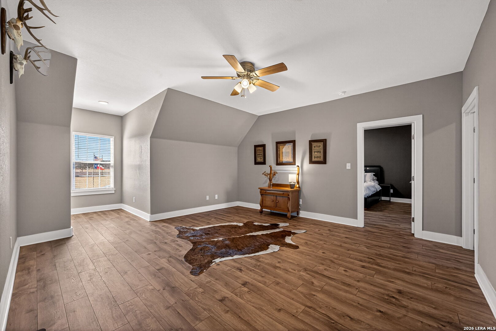 932 County Road 761 Devine, TX 78016 - Photo 32 of 47 a living room with furniture and a wooden floor