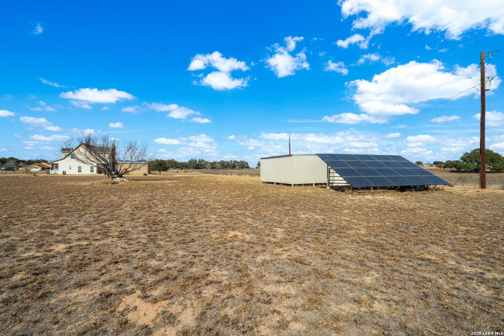 932 County Road 761 Devine, TX 78016 - Photo 38 of 47 a view of a terrace space