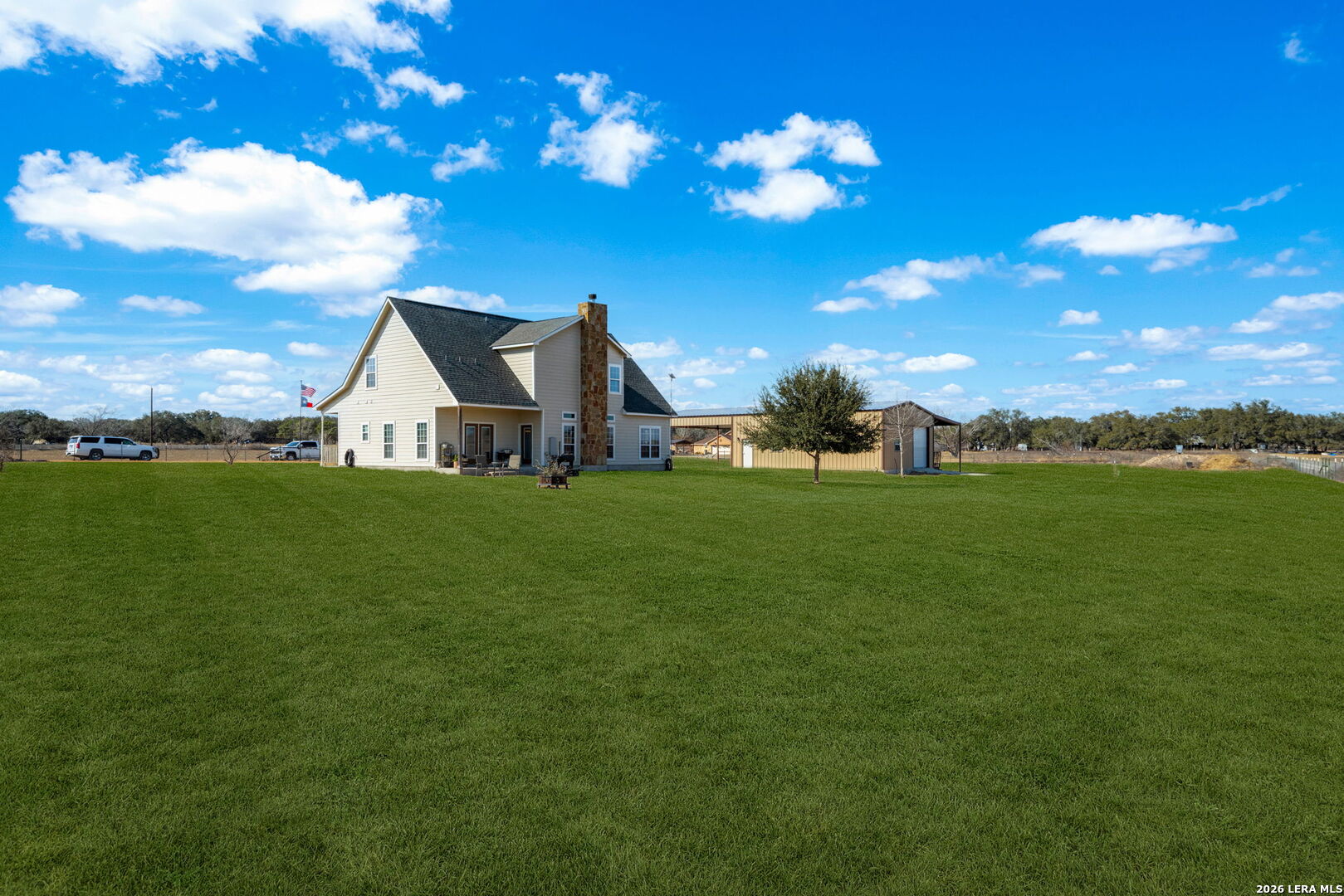 932 County Road 761 Devine, TX 78016 - Photo 41 of 47 a view of a house with a yard