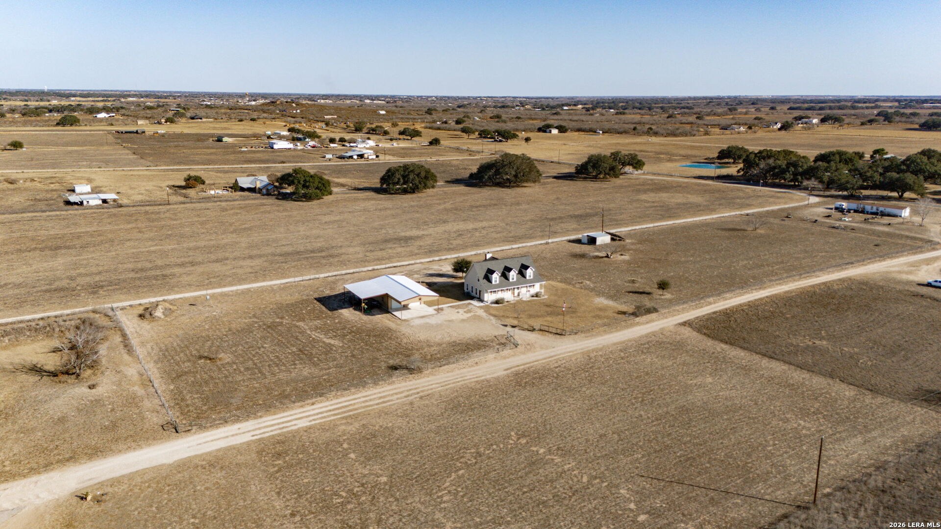 932 County Road 761 Devine, TX 78016 - Photo 46 of 47 an aerial view of a building and ocean view