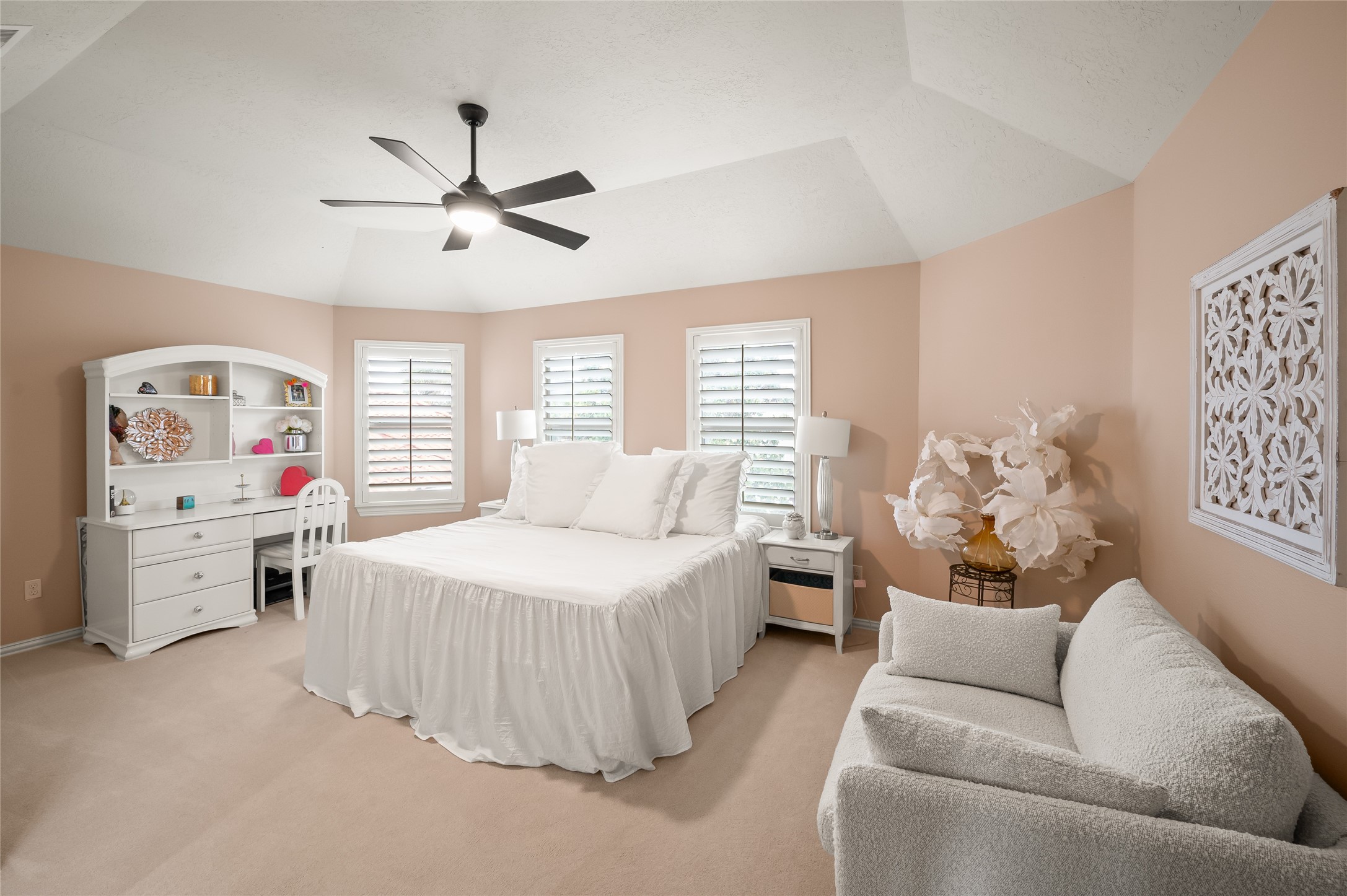 2127 Thicket Ridge Lane Houston, TX 77077 - Photo 29 of 48 This oversized upstairs bedroom shares a full bath with an adjoining room, a walk-in closet, plantation shutters that provide a view of the backyard. It is large enough to easily fit the shown king-size bed AND couch.