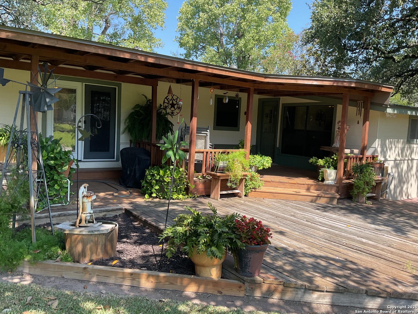 1408 Libold Drive Devine, TX 78016 - Photo 23 of 32 a house view with sitting space and garden space