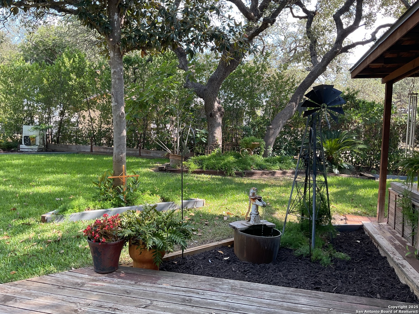 1408 Libold Drive Devine, TX 78016 - Photo 25 of 32 a garden view with a seating space