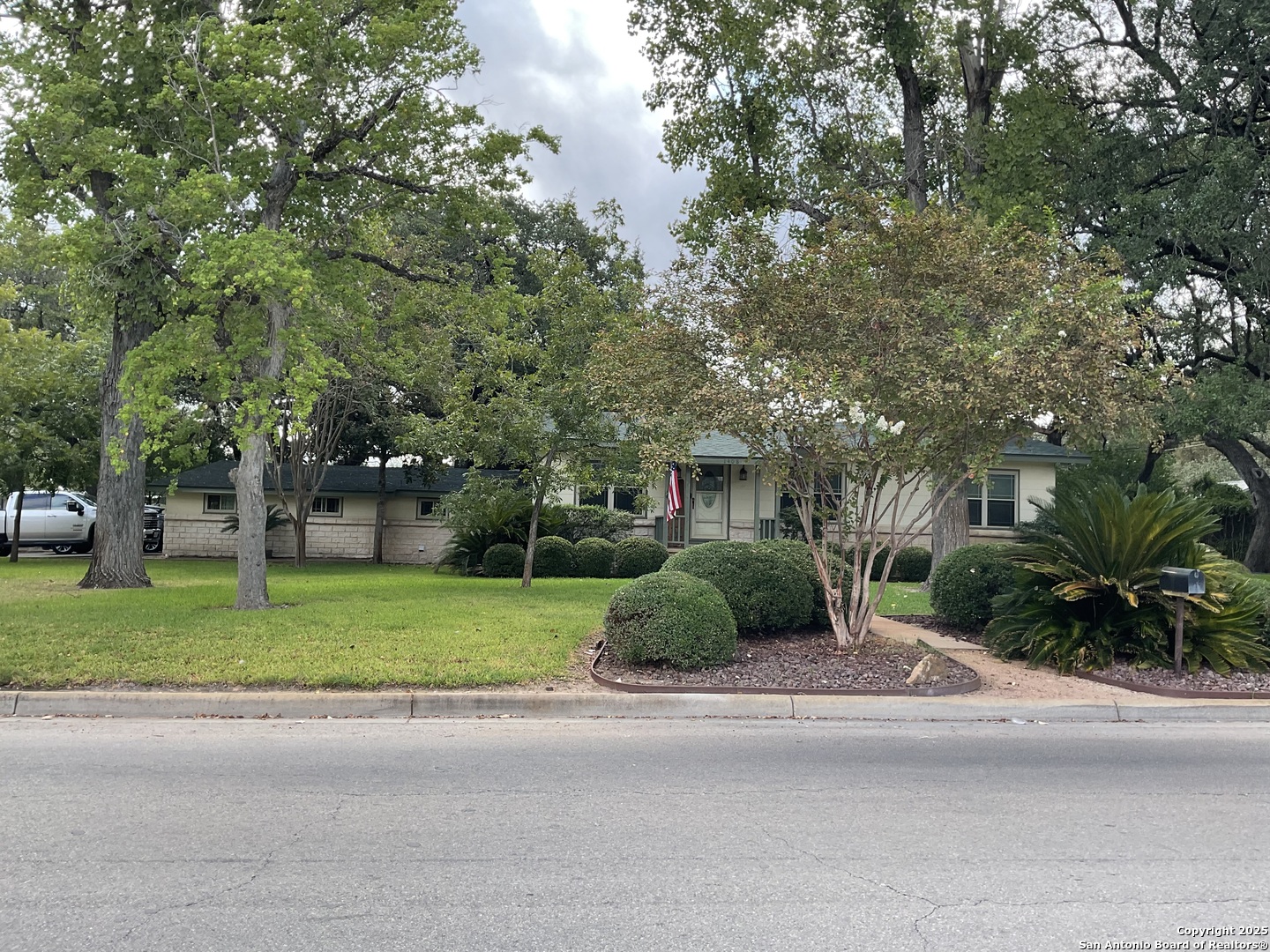 1408 Libold Drive Devine, TX 78016 - Photo 29 of 32 a view of a street with a house in background