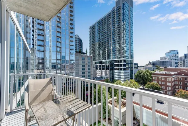 a view of balcony with a potted plant