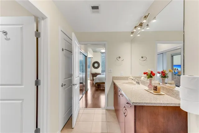 a very nice looking dining room with a table and chairs