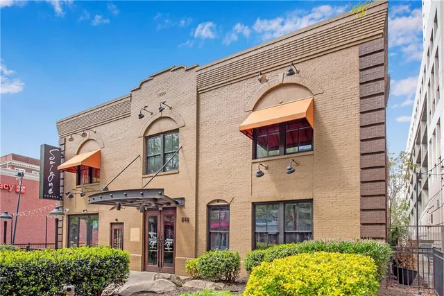 a view of a building with a bench
