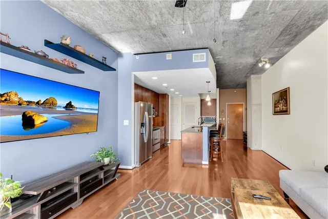 a very nice looking room with wooden floor