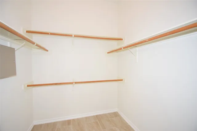 a view of a room with racks on the wall