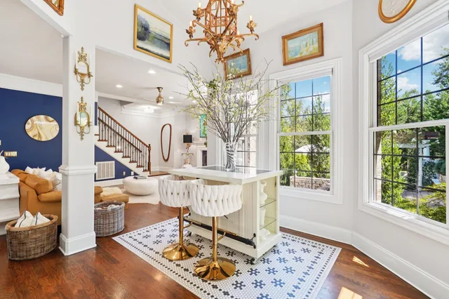 a bathroom with a toilet a sink and a mirror