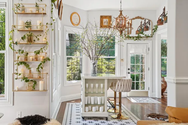 a spacious bedroom with a large bed and a couch