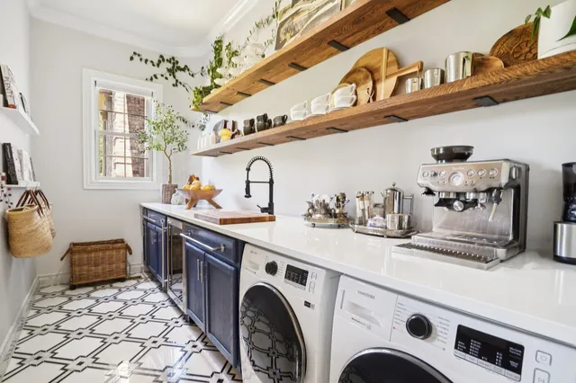 a white toilet sitting next to a bathroom sink