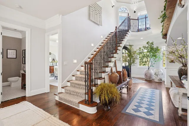 a view of living room with furniture and floor to ceiling windows