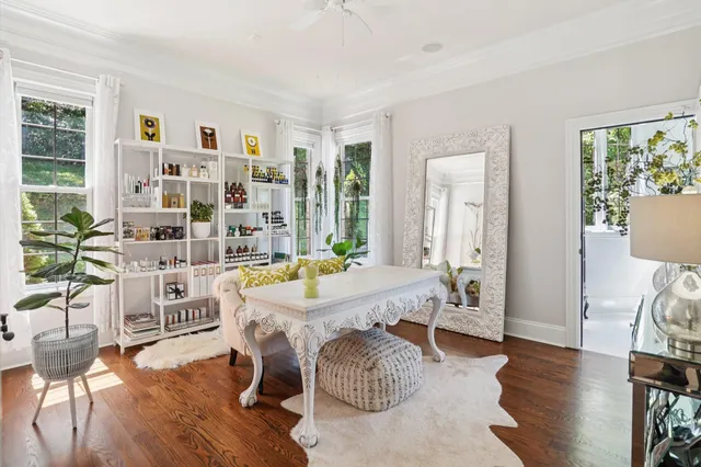 a utility room with a washer and white walls