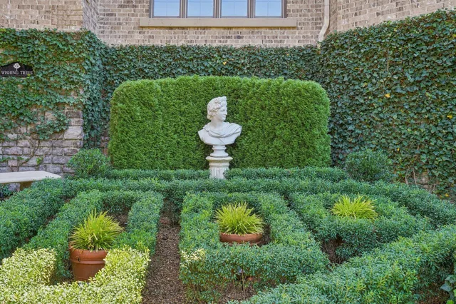 a view of a balcony with wooden floor and fence