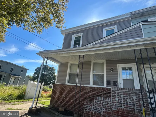 a view of a house with a patio