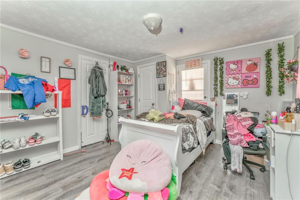 424 Wayside Road Rome, GA 30161 - Photo 8 of 16 a bedroom with bed and the window