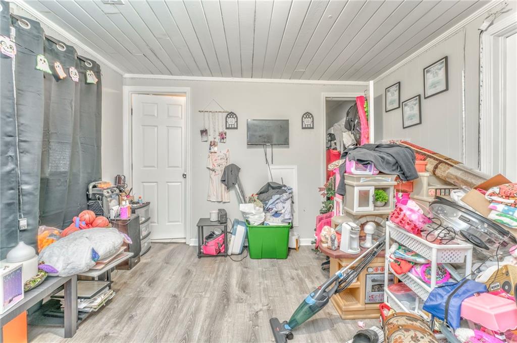 424 Wayside Road Rome, GA 30161 - Photo 10 of 16 a living room with furniture and toys