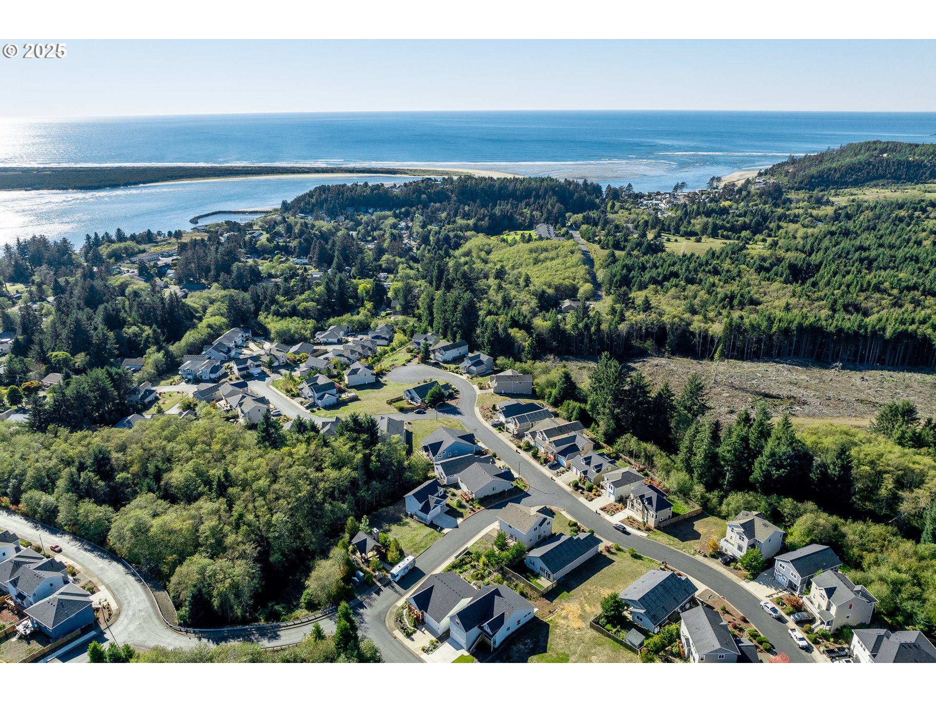 Sequoia Loop, Unit 116 Tillamook, OR 97141 - Photo 12 of 13 an aerial view of a residential houses with outdoor space and trees
