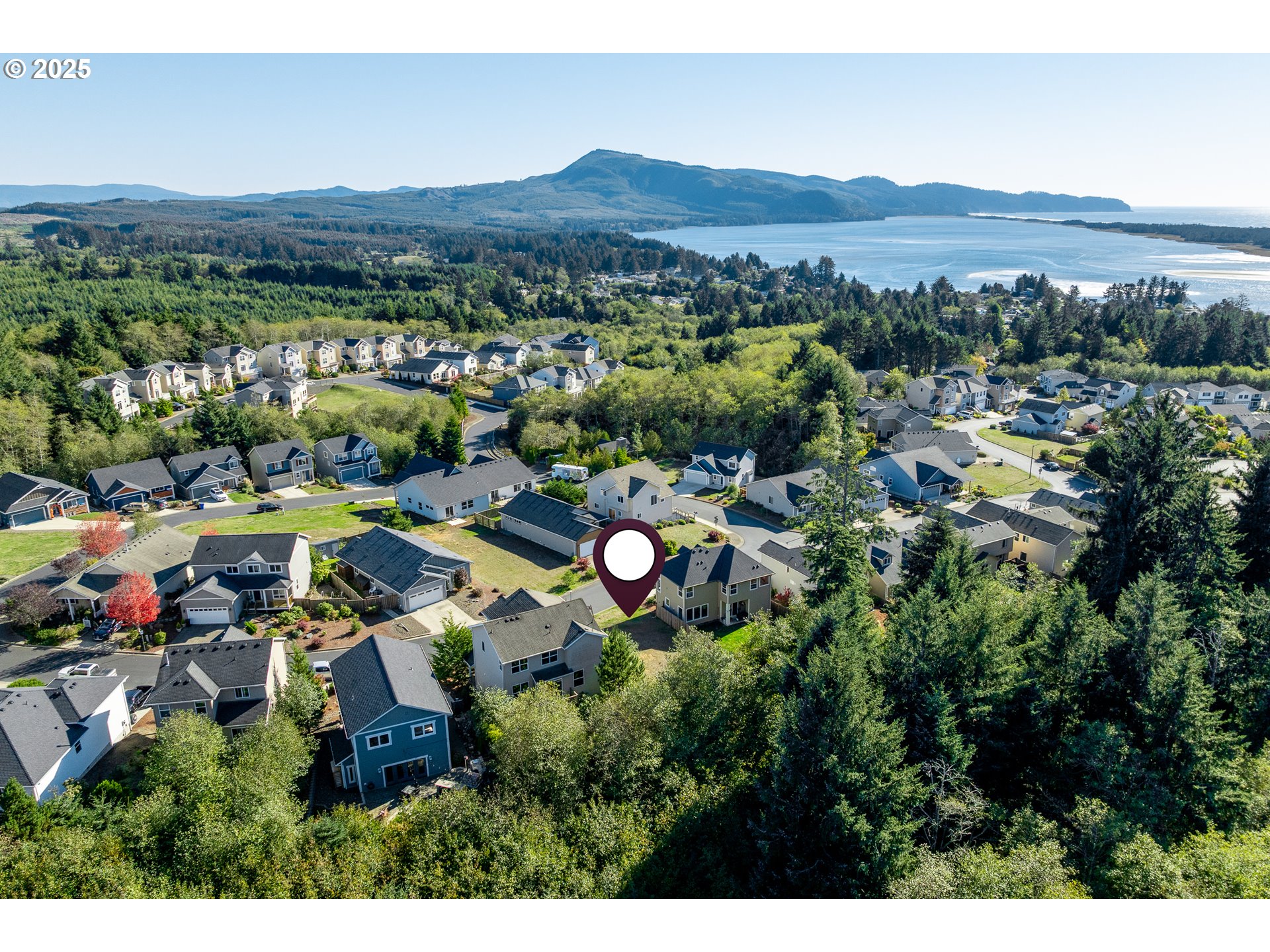 Sequoia Loop, Unit 116 Tillamook, OR 97141 - Photo 13 of 13 an aerial view of multiple house