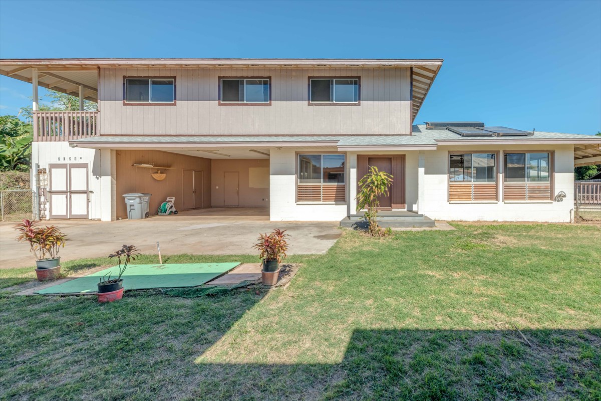 7921 Koae Road Kekaha, HI 96752 - Photo 15 of 25 a front view of a house with garden