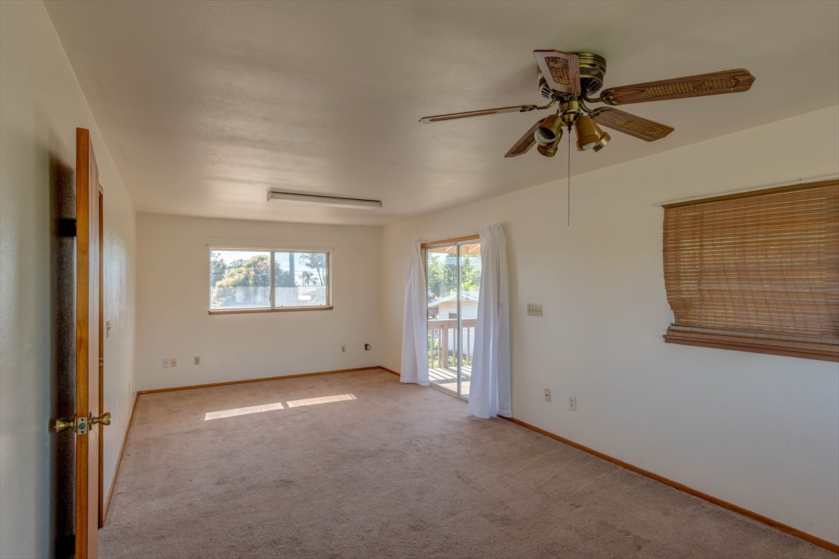 7921 Koae Road Kekaha, HI 96752 - Photo 24 of 25 an empty room with windows and fan